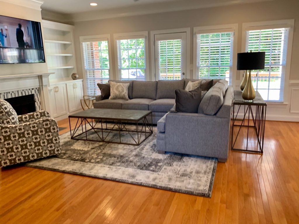 Open design living room, hardwood and area rug
